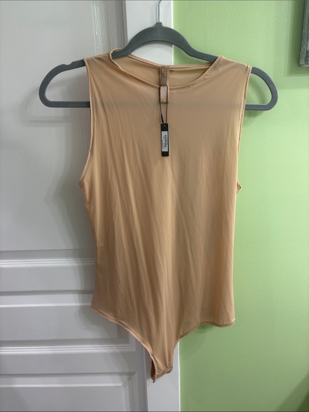 SKIMS Sleeveless Beige-Tone Stretch Bodysuit